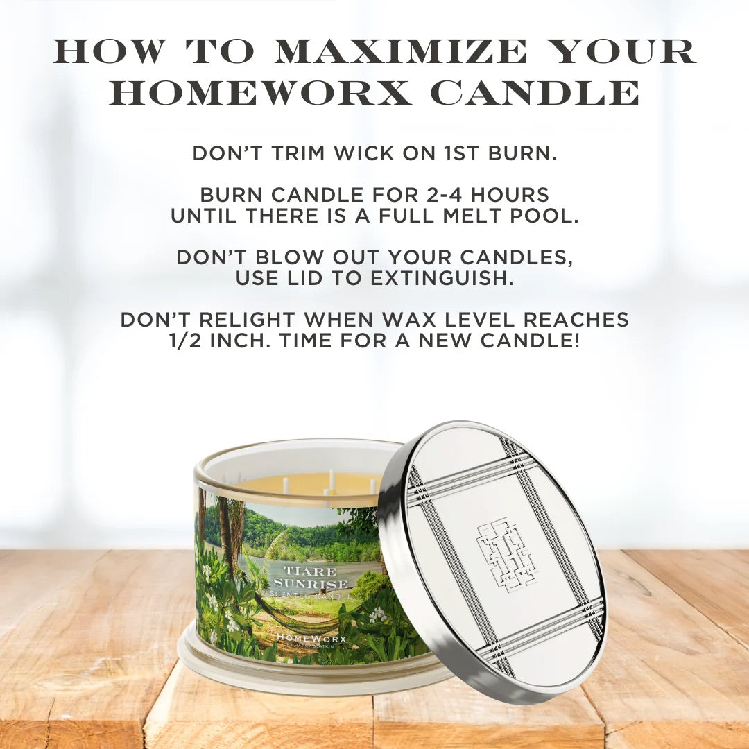 HomeWorx Tiare Sunrise candle in metal tin with lid on wooden surface with usage tips