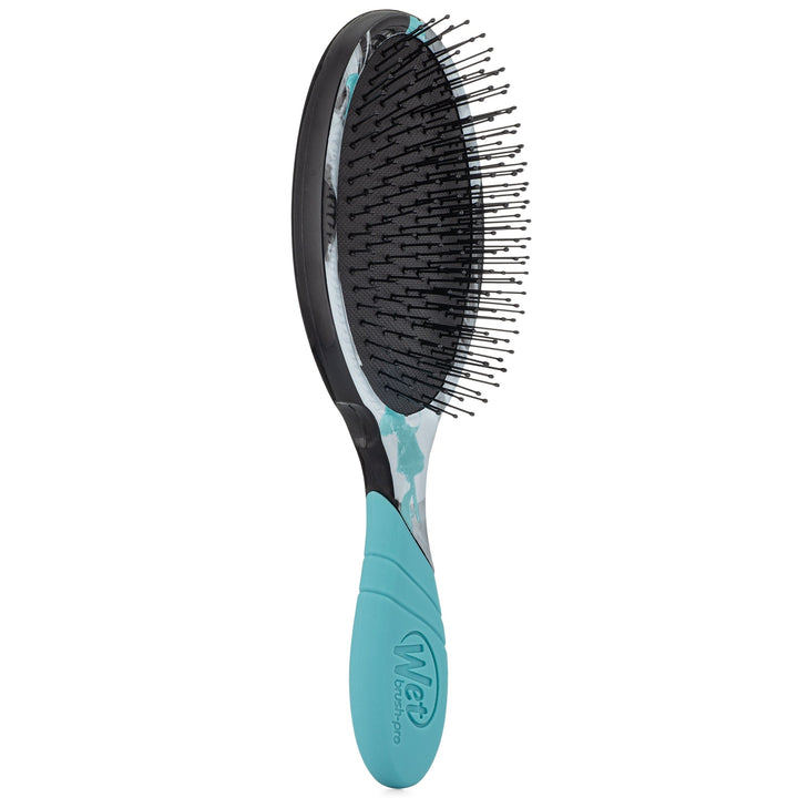 Wet Brush Inked Impressions tattoo style hair brush with teal handle and flexible bristles
