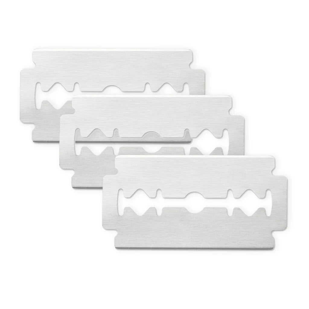 Three stainless steel double edge Jaguar R1 razor blades stacked showing sharp edges for precise shaving