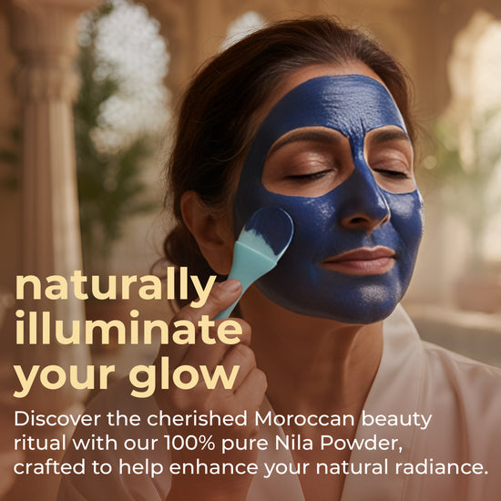 Woman applying face mask with natural indigo powder for hair, promoting radiant skin and beauty rituals