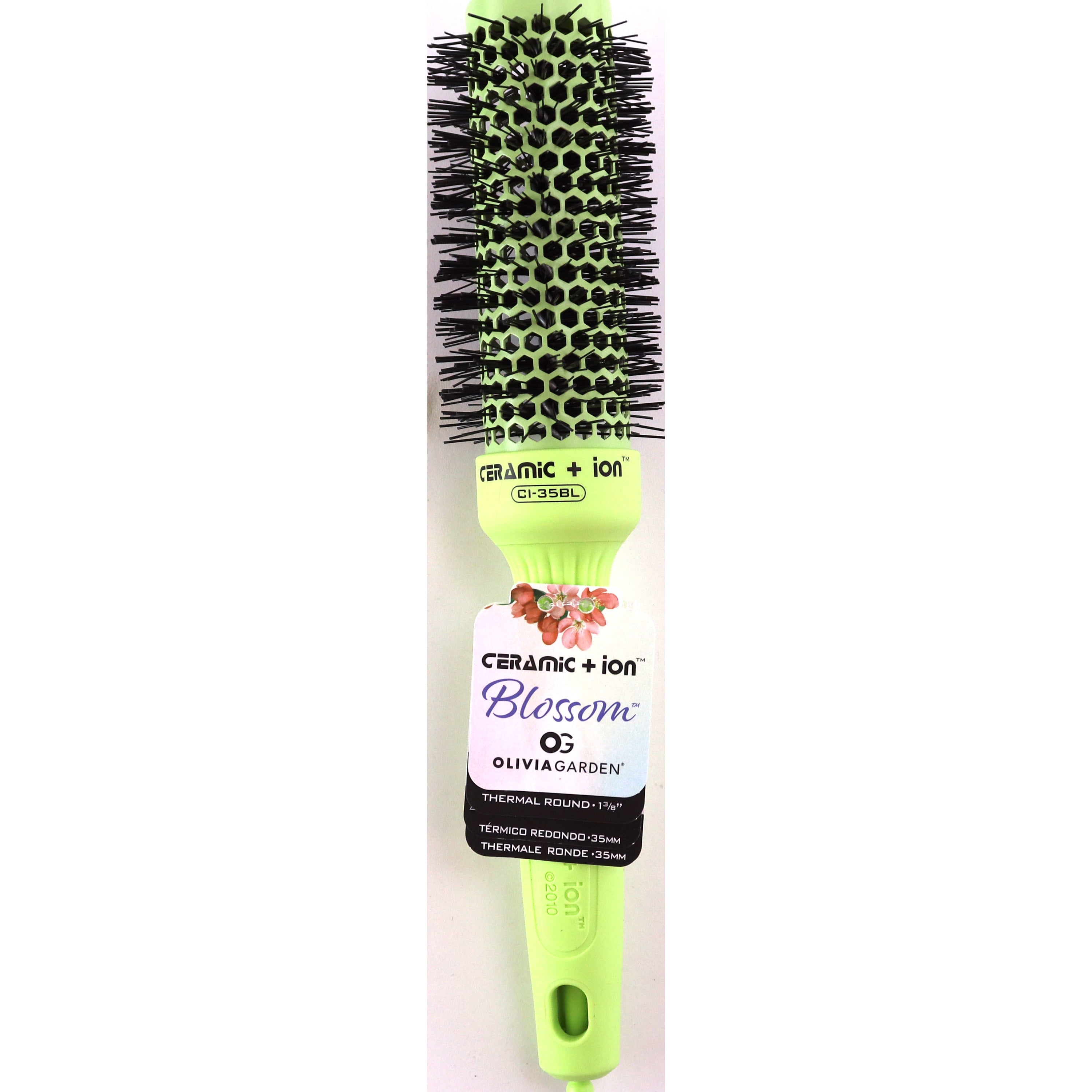 Olivia Garden ceramic ionic hair brush with green handle and black bristles for thermal styling