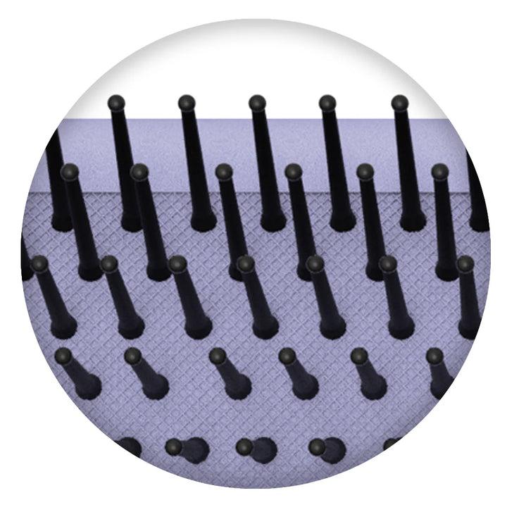 Close-up of black bristles on Olivia Garden large paddle brush for thick hair with ball tips