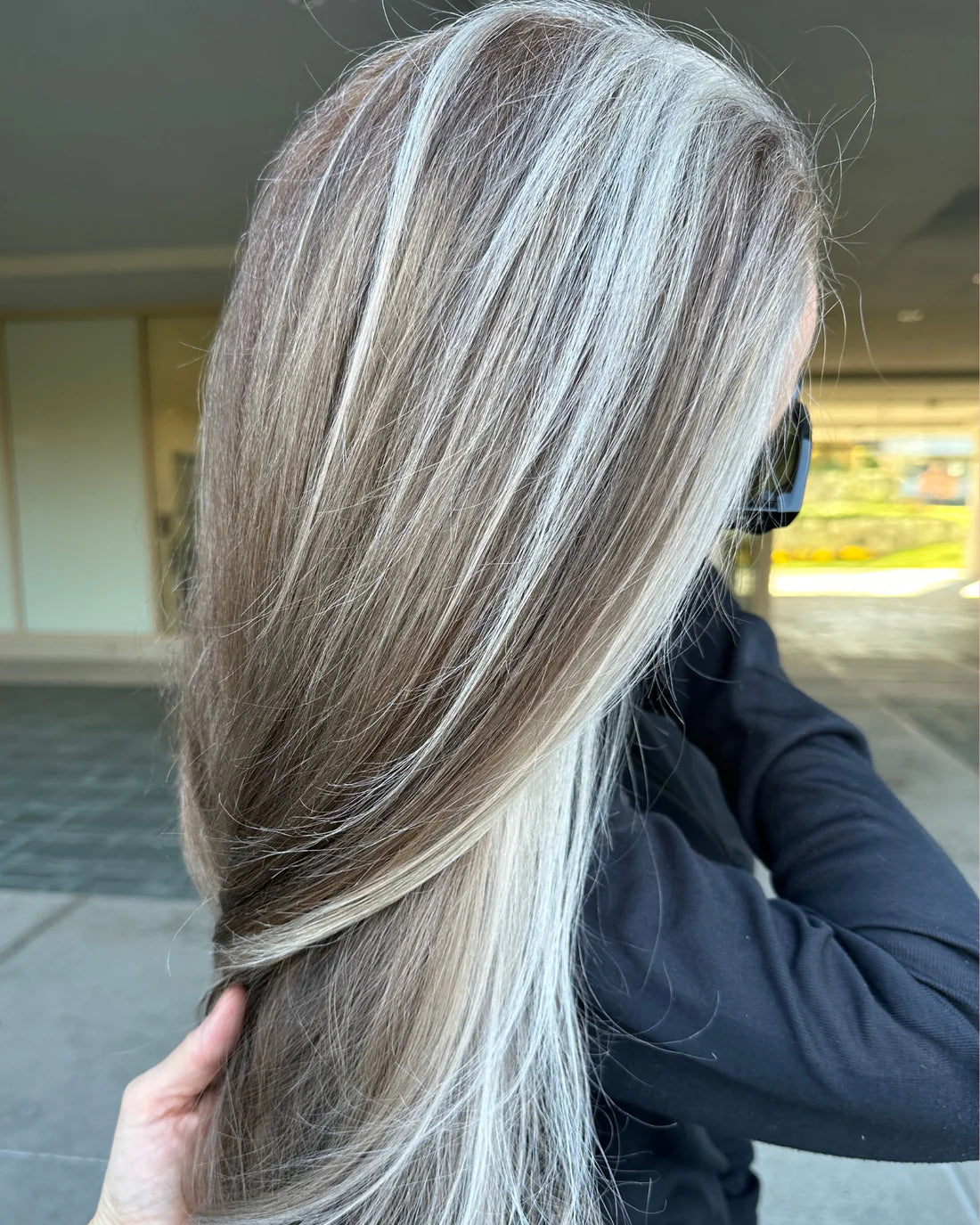 Smooth silver hair showcasing results of One 'N Only silver conditioner 12 oz for vibrant color