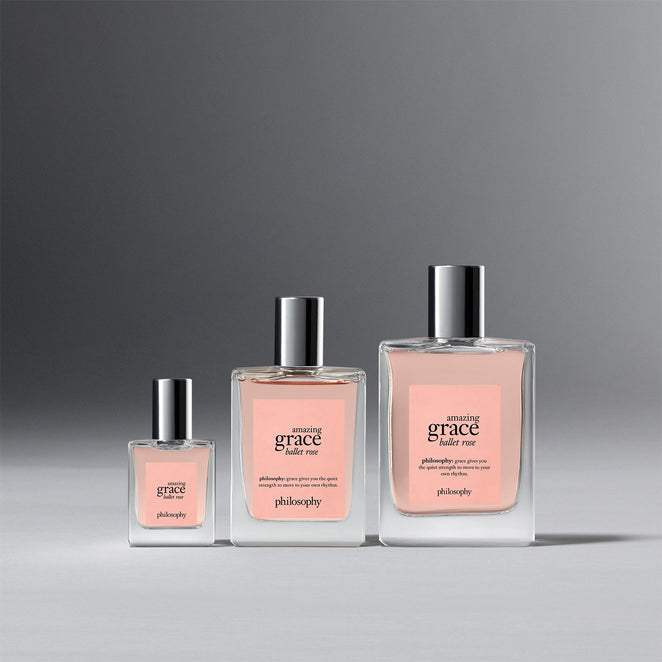 Three sizes of Philosophy Amazing Grace Ballet Rose perfume bottles with pink labels and silver caps