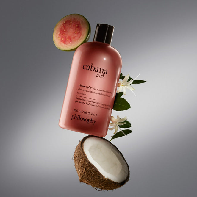 Philosophy Cabana Girl shower gel bottle with guava slice coconut half and white flowers