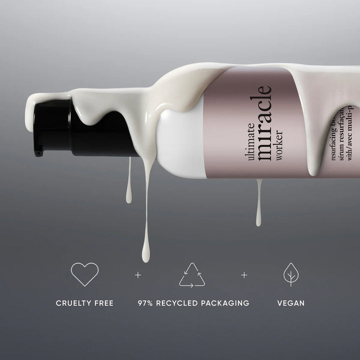 Philosophy resurfacing body serum bottle with creamy texture dripping showcasing cruelty free vegan formula