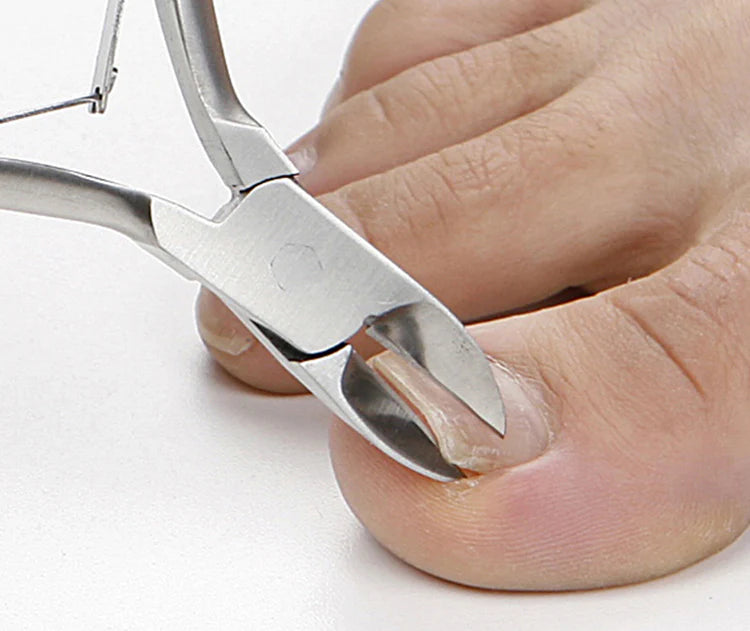 Close-up of Seki Edge nail clippers trimming a toenail for precise grooming