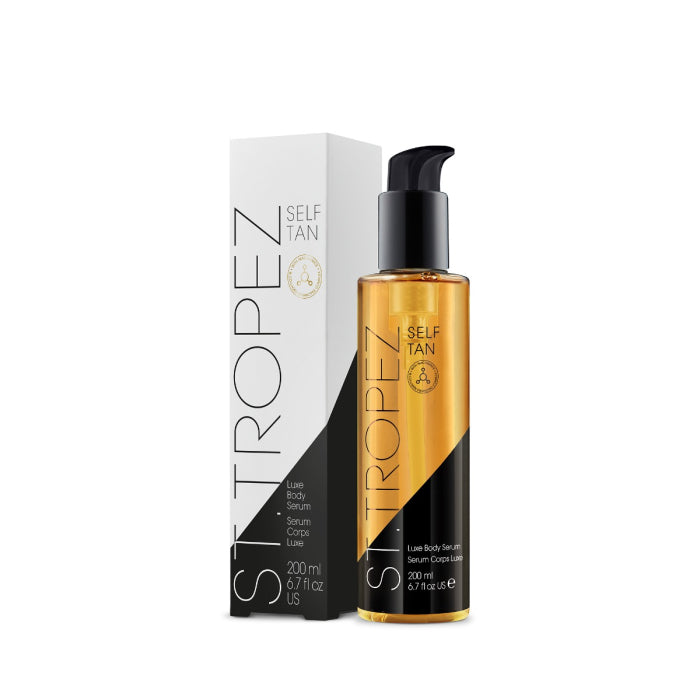 St. Tropez body serum self tan bottle and white box with black and gold design 200ml