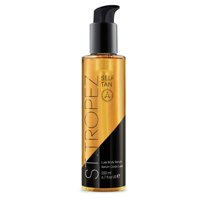 St Tropez body serum in clear pump bottle with black and gold label for self tanning