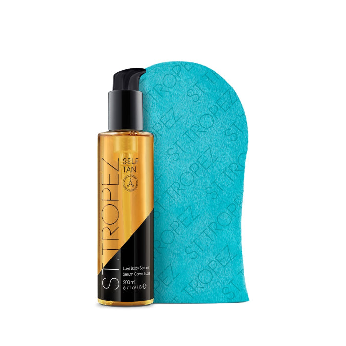 St Tropez body serum bottle with black pump and turquoise application mitt for self tanning