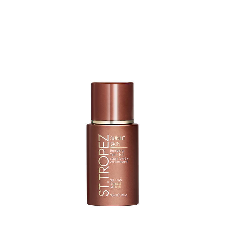 St Tropez bronzing tint Sunlit Skin self-tan drops bottle with exfoliating results