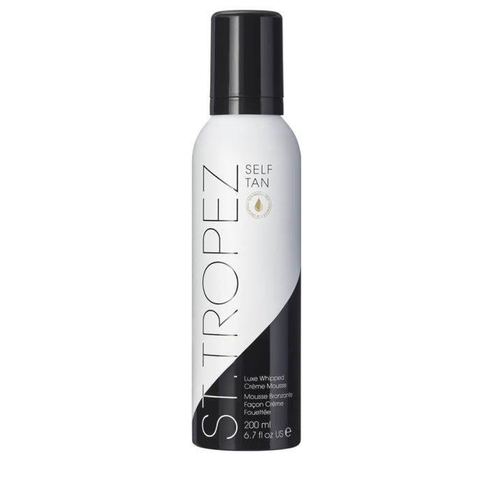 St. Tropez self tanning mousse 200ml bottle with black and white packaging for an even tan