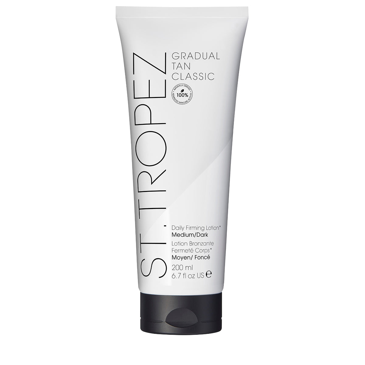 St Tropez gradual tan lotion medium dark in a white and black 200ml tube for daily firming and tanning