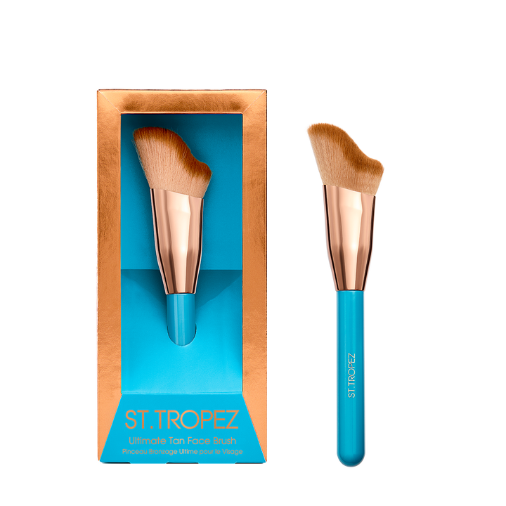 St Tropez ultimate tan face brush with angled bristles and blue handle with rose gold ferrule
