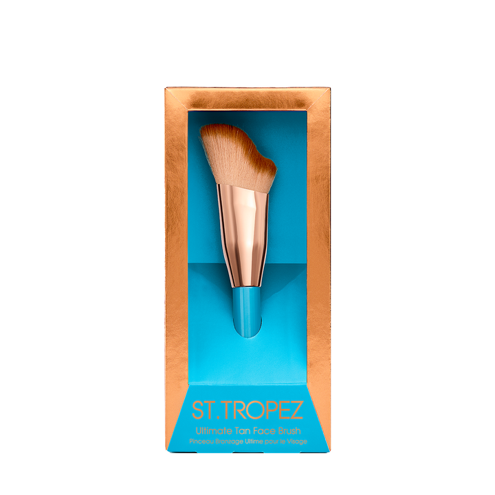 St Tropez ultimate tan face brush with angled soft bristles in rose gold and blue packaging