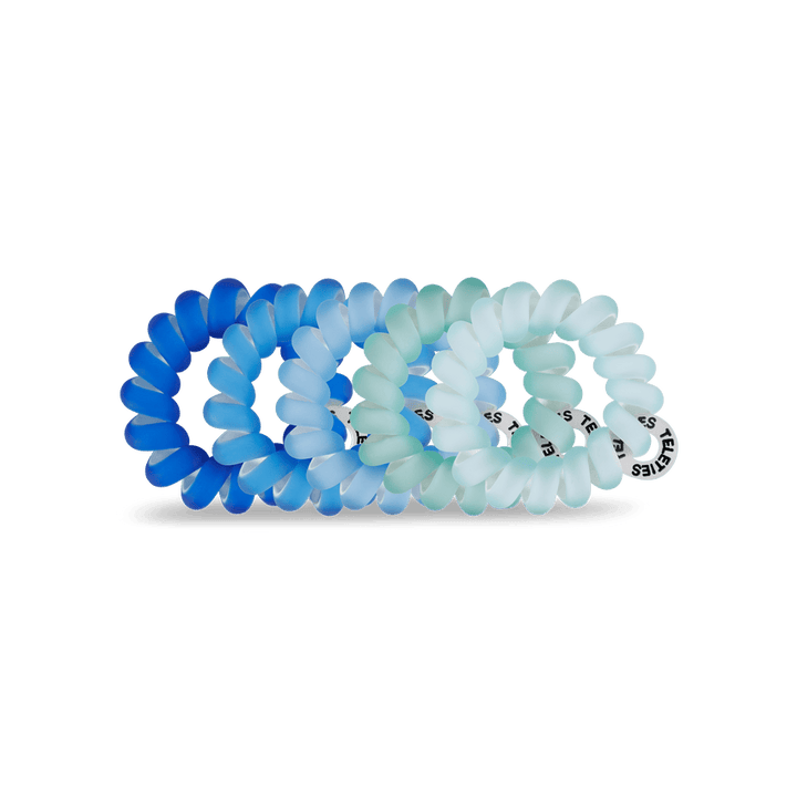 Teleties tiny hair ties in blue and green gradient colors for secure and stylish hair styling