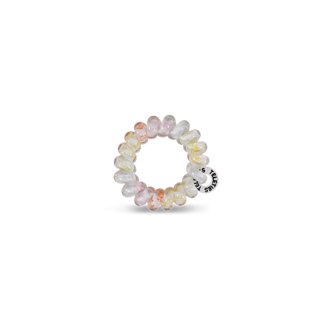 Teleties tiny hair ties in pastel colors, perfect for holding hair without damage