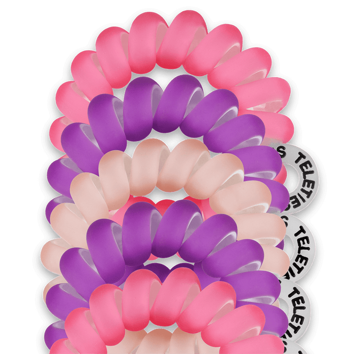 Teleties tiny hair ties in pink and purple colors, perfect for secure and stylish hair styling
