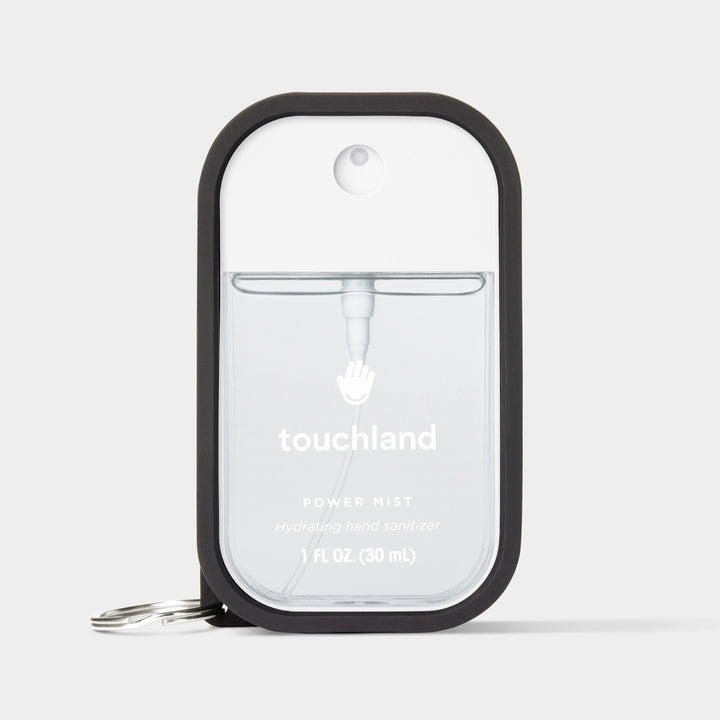 Touchland hand sanitizer mist in sleek container for effective hydration and germs protection