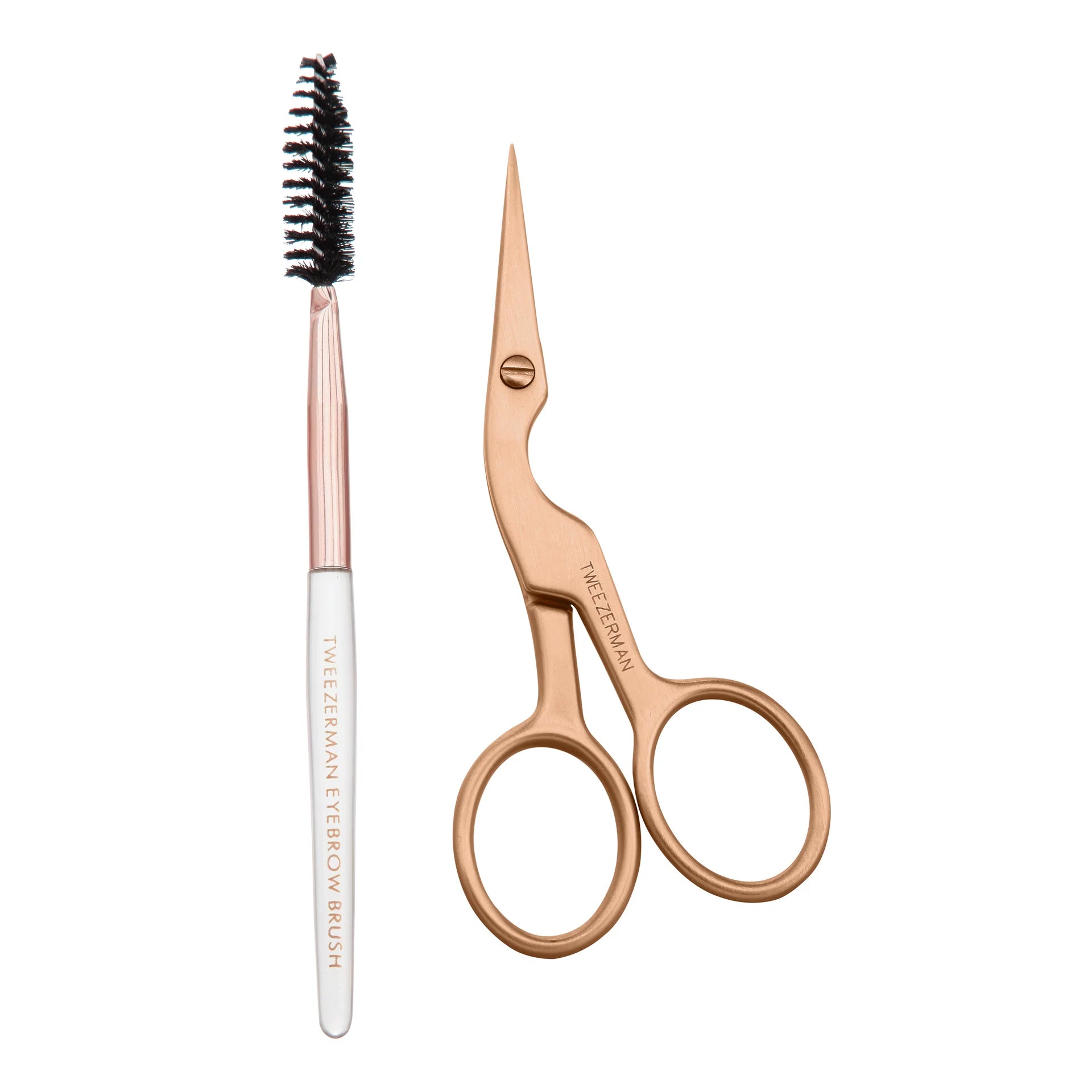 Tweezerman brow scissors with a rose gold finish and a matching eyebrow brush for precise grooming