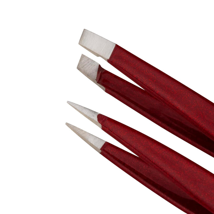 Tweezerman mini tweezer set in vibrant red with precision tips for accurate grooming.