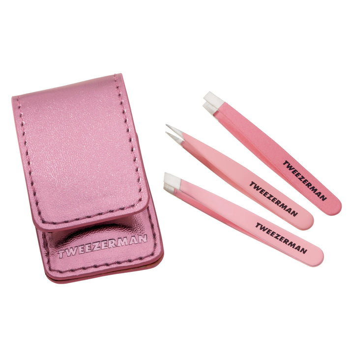 Tweezerman tweezer set in pink with three tools and a stylish carrying case for precision grooming.