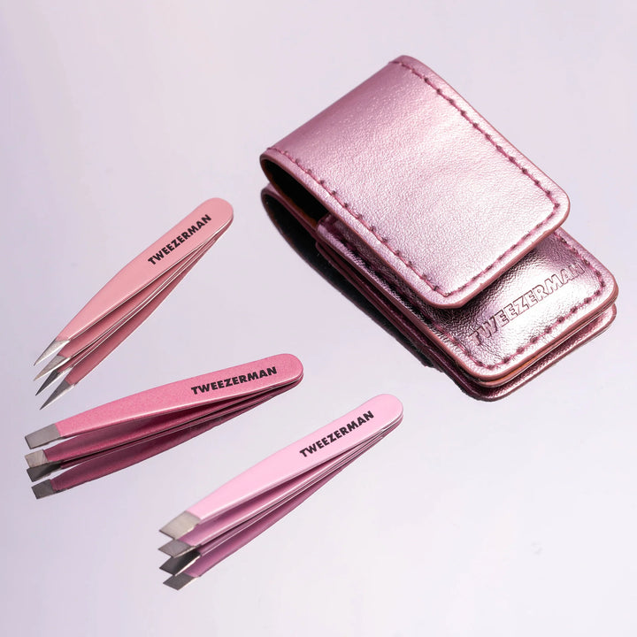 Tweezerman tweezer set with three precision tweezers in pink and a stylish carrying case