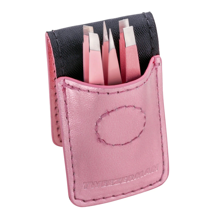 Tweezerman tweezer set in a pink carrying case for precision grooming and eyebrow shaping