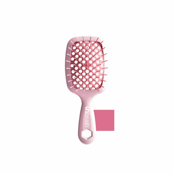Unbrush glitter hair brush in pink with flexible bristles and ergonomic handle for gentle detangling