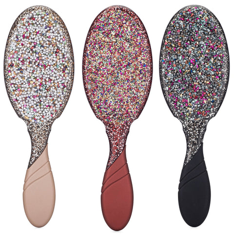 Set of three Wet Brush Crushed Jewels Detangler brushes in neutral, rose, and black handles with sparkling jewel designs