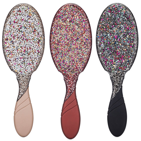 Set of three Wet Brush Crushed Jewels Detangler brushes in neutral, rose, and black handles with sparkling jewel designs