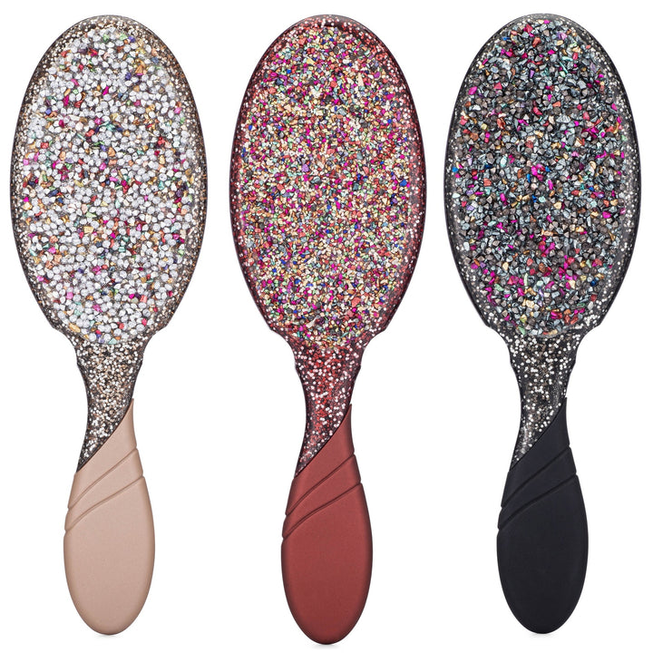 Set of three Wet Brush Crushed Jewels Detangler brushes in neutral, rose, and black handles with sparkling jewel designs