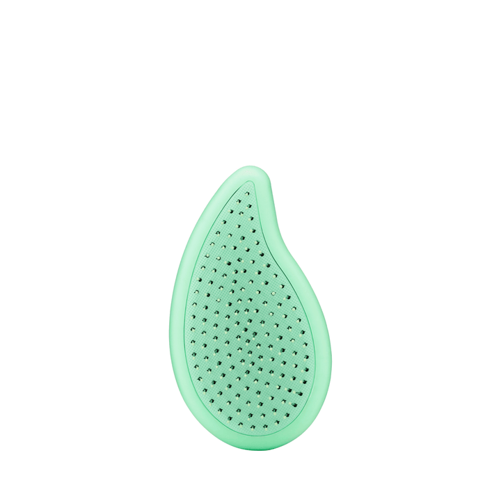 Wet Brush palm detangler in mint green with ergonomic teardrop shape and flexible bristles