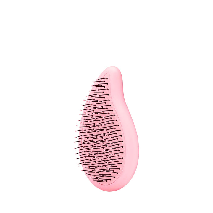 Wet Brush palm detangler in pink with flexible bristles for gentle hair detangling
