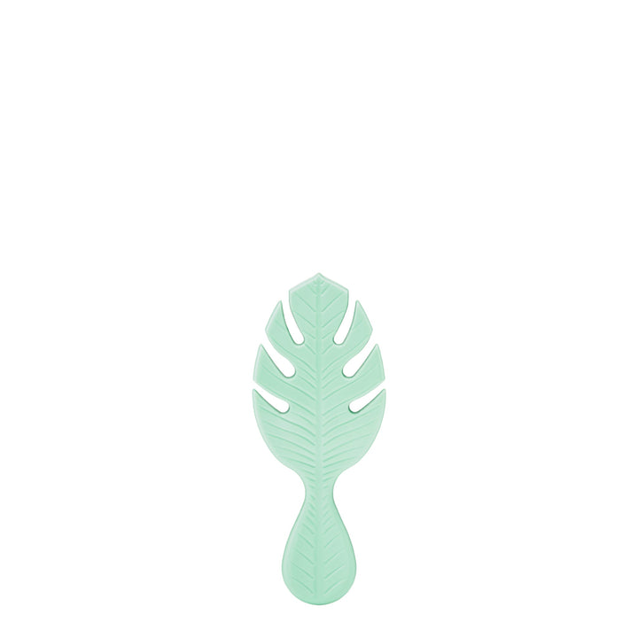 Wet Brush eco-friendly mini hairbrush in light green shaped like a tropical leaf