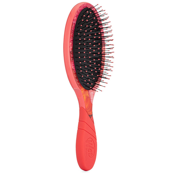 Wet Brush Rare Botanicals hair brush with coral handle and flexible bristles for gentle detangling