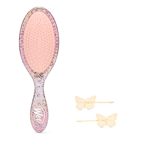 Wet Brush Wicked detangling brush with pink paisley design and two gold butterfly hair clips