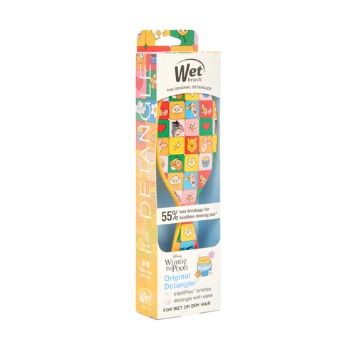 Winnie the Pooh hair detangler brush with colorful character design for easy detangling and styling
