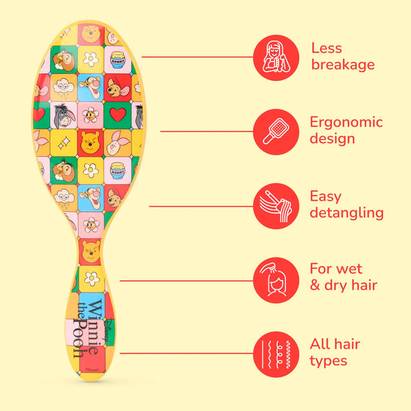 Winnie the Pooh hair detangler brush with ergonomic design for easy detangling on all hair types