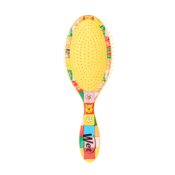 Winnie the Pooh hair detangler brush by Wet Brush with a fun colorful design for easy hair care