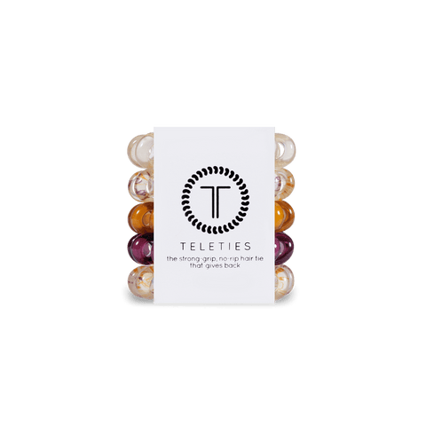 Teleties tiny hair ties in assorted colors packaged for strong, no-slip hold and style