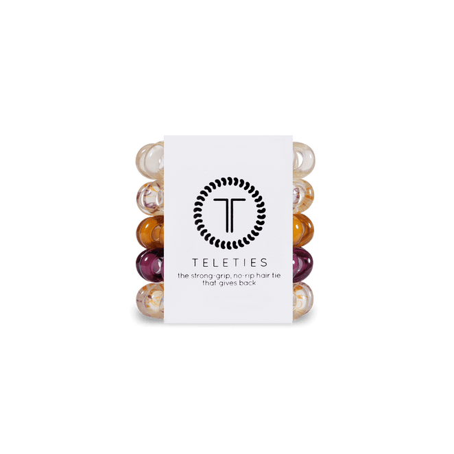 Teleties tiny hair ties in assorted colors packaged for strong, no-slip hold and style