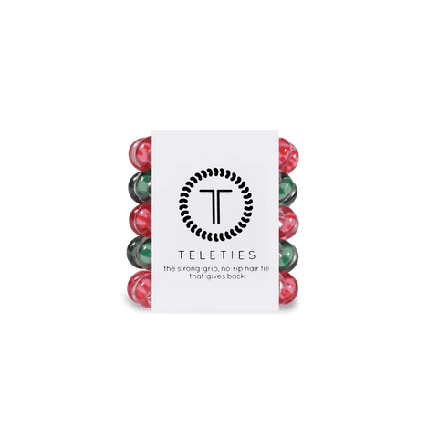 Teleties tiny hair ties in red and green colors packaged neatly for easy storage and stylish hair solutions