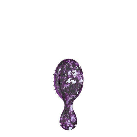 Wet Brush Mini Detangler hairbrush in purple with a marbled pattern and ergonomic handle