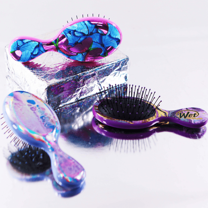 Wet Brush butterfly design hairbrush with vibrant blue butterfly pattern and flexible bristles