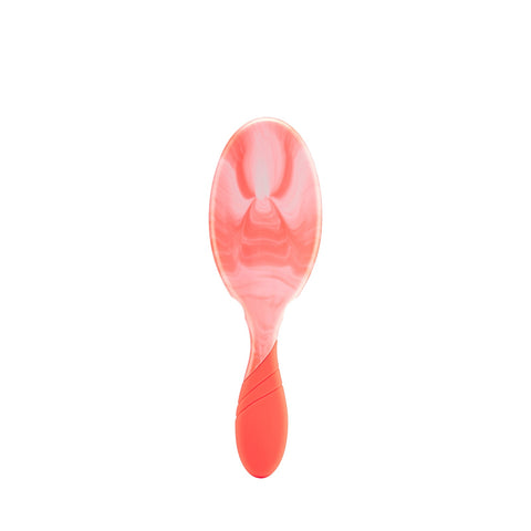 Wet Brush Color Shock Pro hairbrush in coral pink with ergonomic handle and flexible bristles