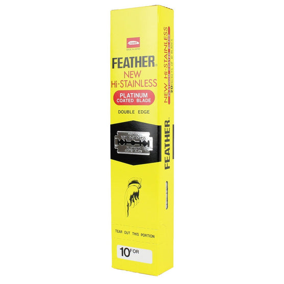 Feather double edge razor blades in a yellow box featuring platinum coated blades for a close shave