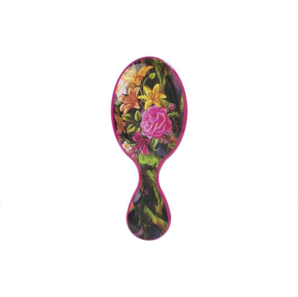 Wet Brush floral pattern detangler with colorful pink and yellow flower design on handle and bristles