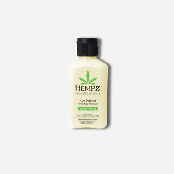 Hempz travel size moisturizer in a yellow bottle for hydrating and anti-aging skincare