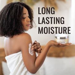 Model applying Dead Sea Shea Body Butter for long lasting moisture on her skin